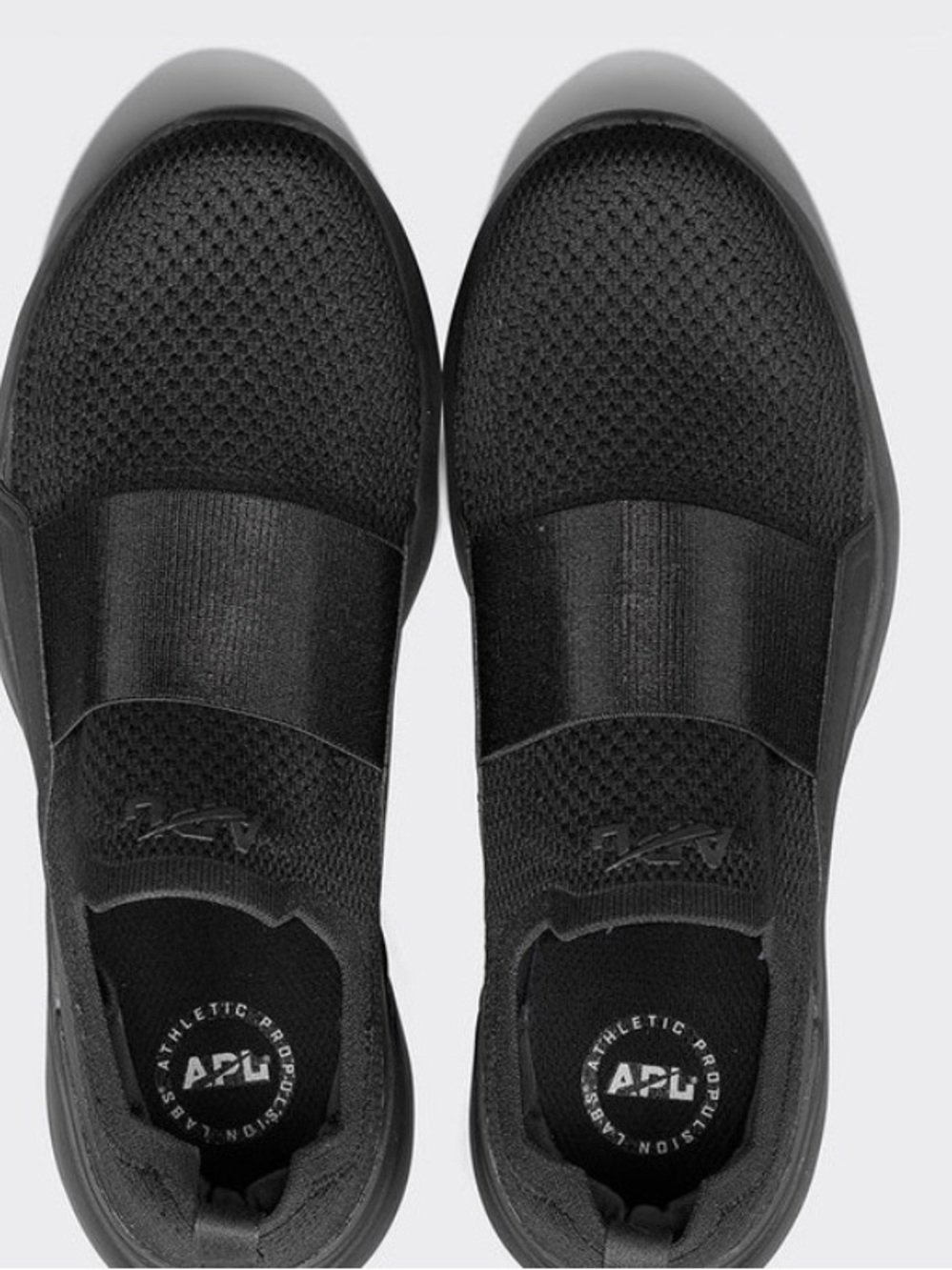 APL womens Slip-On Knit Sneaker in Black